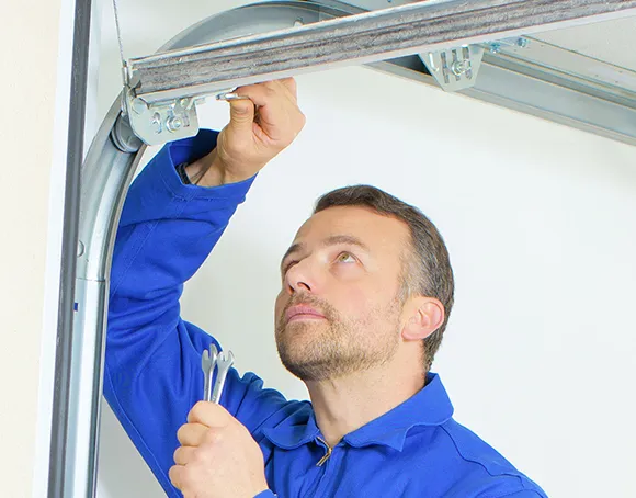 Professional technician repairing a garage door, ensuring quality service in Rocklin, CA.